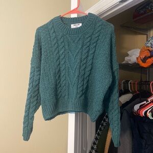 Green cable knit sweater